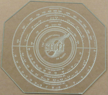 Dial image taken against a tan/brown background to illustrate off-white dial scale print. Dial glass is clear other than scale print.