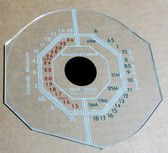 Dial image taken against a tan background to illustrate white print part of dial. Dial is clear other than scale printing.