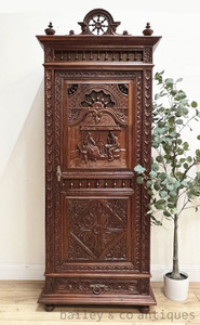 An Antique French Heavily Carved Breton Armoire Bonnetiere  - E085