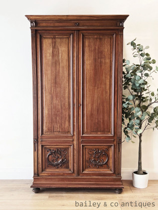An Antique French Gothic Revival Carved Oak Armoire - G052