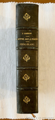 Buy a stunning 1932 French book deluxe custom leather edition of Jack London's Call of the Wild (L'Appel de la Forêt). Beautiful gold gilt spine & marbled boards.
