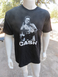Front: Cash. Johnny Cash, as in the flippin' legend. R.I.P. Don't wear this one to brunch at your mama's on Sunday.
Back: BLANK. 'nuf said.