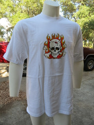 Flaming Skull by Kozik appears on front of t-shirt.