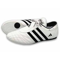 Beloved since its introduction 12 years ago, this classic martial arts shoe has become the standard by which all others are judged. And with good reasonÃ³its fast and simple design allows for the natural movement of the foot through a variety of indoor exercises. White with black stripes.