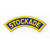 This blue curved patch with a yellow border features the word "STOCKADE" in yellow and is used on the shoulder of the Stockade uniform shirt.