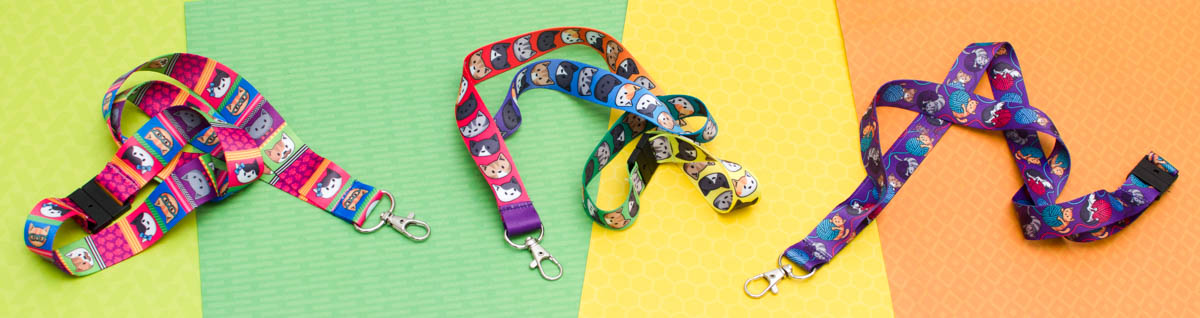 Photo banner of three colourful lanyards on a green yellow and orange background