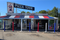 1/8" Red, White, and Blue Bollard Covers in front of Pizza Shop