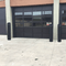 10" Skyline Decorative Bollard Cover in black protecting garage entrance 