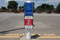 Bollard Sign On System with Custom Frame and White Bollard Cover