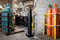 Black 6" x 48" Plated Bollard Cover protecting a storage area
