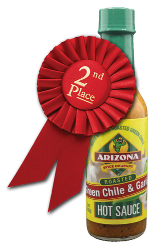 Medium heat Roasted Green Chile from Hatch NM and plenty of garlic.  Low in the vinegar taste and versatile on uses.  Great on steak, chops, chicken, cheese crisp and just about everything else.
