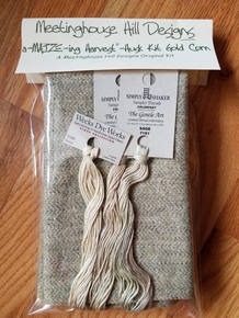 Felted wool and hand-dyed threads for Husks.
