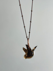 flying bird charm