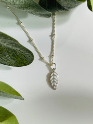 tiny leaf charm