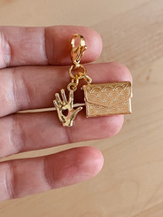the kissing hand book bag charm