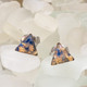 gold bezel, blue lapis, and gold flecks