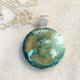 mermaid green & gold ( silver setting) 