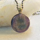 eggplant & gold (brass setting)