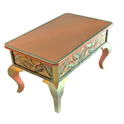 jItterbug coffee table with pod motif in  jade and coral 