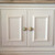 Mini duos emerald on ivory painted built-ins.