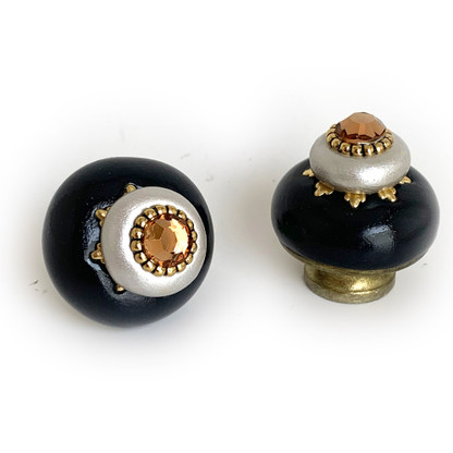 Pair of Nu Dahlia black and Alabaster knobs 1.5 in. diameter with gold metal accents and smoke topaz crystal