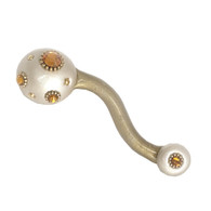 Style 6 alabaster Eel Right pull 5 in. with 4 in. hole span has gold metal details and topaz crystals.