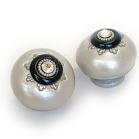 Pair of Nu lily knobs IRR in alabaster and black with crystal 1.5  in. diameter