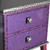 Rumba 2 drawer end table has smoke ring pattern in mauve and emerald