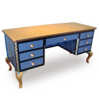 Jitterbug desk in light sapphire paint finish has file drawer concealed by 2 drawer facade. 