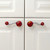 Kitchen cabinetry with Eel style 6 pulls in right and left orientation.