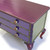 Top surface has shimmering paint finish in amethyst purple