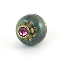 Nu Ivy Knob Turquoise 1.5 Inches Diameter has gold metal details and Swarovski amethyst crystal