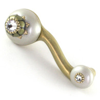Ivory eel right pull 4 in. with 3 in. hole span has gold metal details and Swarovski crystals