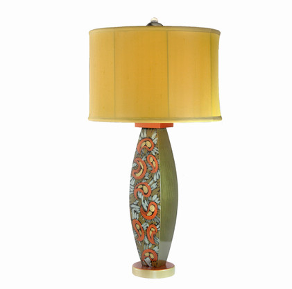 Lolita lamp  with shallow drum shade in gold silk has paint treatment in bronze, copper and aqua