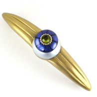 Tiki Light Sapphire Orbit7 pull 7 Inches with 5 Inch Spread has gold metal details and olivine crystal