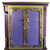 Diva Armoire upper cabinet in periwinkle and amethyst purple surrounded by jade green paint treatments.
