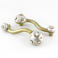 Style 6 alabaster Eel pulls 4 in. with 3 in. hole span have gold metal details and Swarovski crystals.