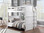 Solid wood dual-height full over full bunk bed in vacation home bedroom