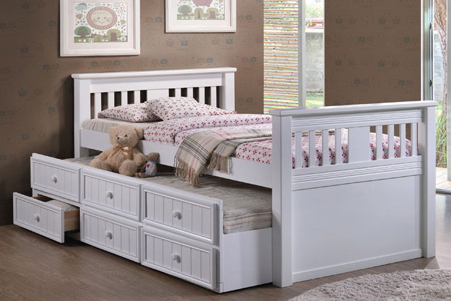 white wood twin bed with trundle