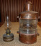 Vintage copper ship's anchor lantern with oil pod