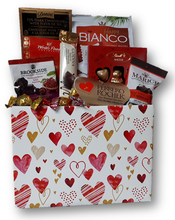What says "Be Mine" better than chocolate on Valentine's Day?  Set the mood with this assortment of chocolates and truffles.
