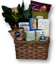 Send this warm and comforting basket during a difficult time.  Beautiful potted plant is surrounded by an assortment of tea, coffee, cappuccino mix, cookies and chocolates.