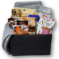 This basket is filled with tea, jam, cookies, biscotti, chocolate, candy and cozy fleece throw - perfect for whiling away a quiet afternoon.