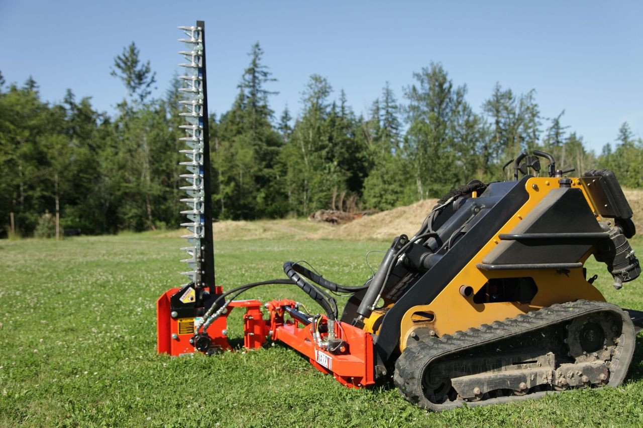 Eterra Mini Skid Steer Sickle Bar Cutter - Parks easily for simple transport.