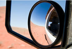 A rear view mirror of a car.
