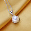 Teardrop White Freshwater Pearl Earrings and Pendant Set in 0.925 White Sterling Silver (MDS170069)