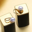 Teardrop White Freshwater Pearl Stud Yellow Gold Plated Earrings in 0.925 White Sterling Silver (MDS210035)