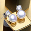 Round White Freshwater Pearl Stud Earrings in 0.925 White Sterling Silver (MDS210055)