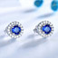Round Blue Nano Sapphire Halo Stud Earrings in 0.925 White Sterling Silver (MDS210264)