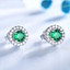 Round Green Nano Emerald Halo Stud Earrings in 0.925 White Sterling Silver (MDS210265)